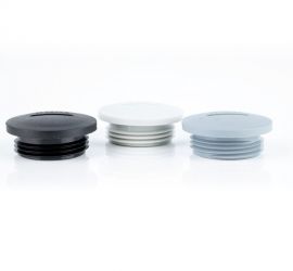 Trois bouchons Jacob en plastique (polyamide PA6 GF30) (Pg), en gris, blanc et noir sur fond blanc.